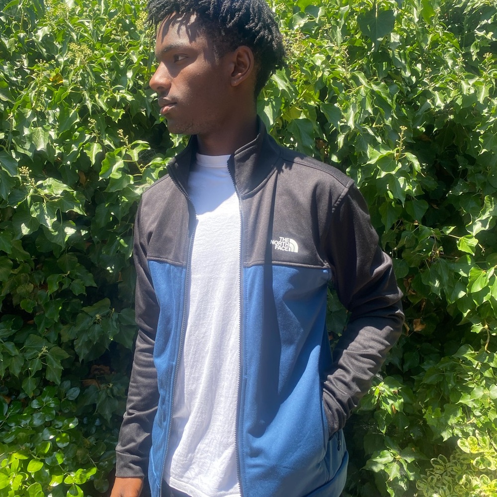 North Face lightweight blue and black zip-up jacket